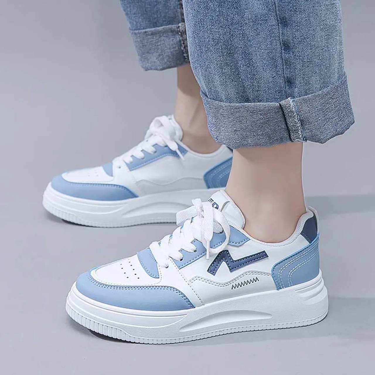 White blue pattern sewn accents shoe sneaker