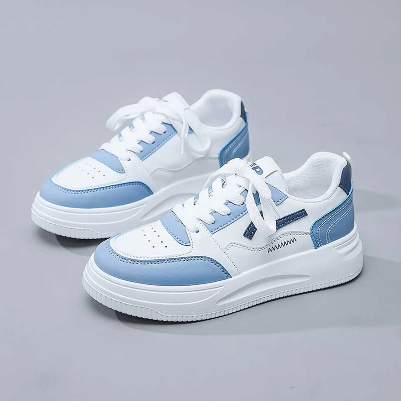 White blue pattern sewn accents shoe sneaker